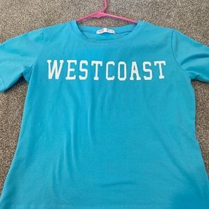 Romwe west coast t shirt. size small new.